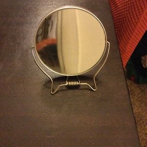 New two sided mirror that can stand and be hand held